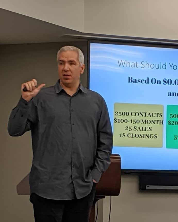 Kevin Smullin teaching real estate agents about marketing